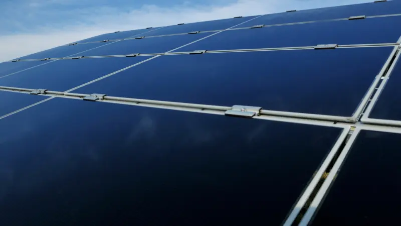Close view of solar panels under a clear sky